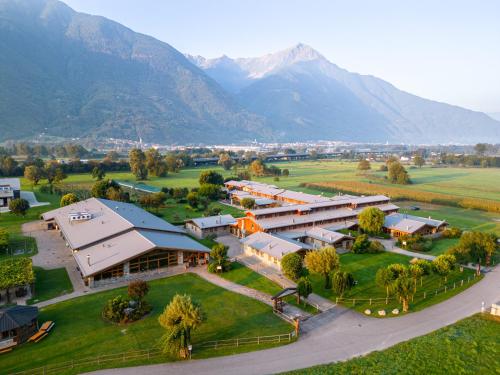 an aerial view of a resort with mountains in the background at Agriturismo La Fiorida in Mantello