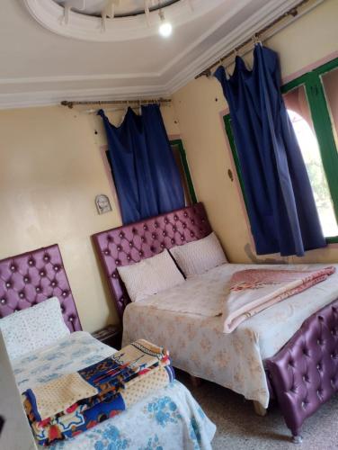 hôtel oasis tinghirにあるベッド