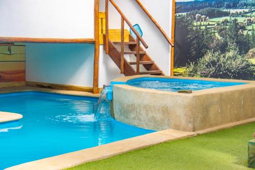 Bazén v ubytování Rustika Pichilemu Apart Hotel Piscina Temperada Hidromasaje nebo v jeho okolí