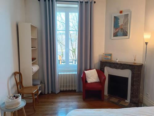 Postel nebo postele na pokoji v ubytování Charmante chambres d'hôtes avec SDB privée