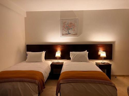 Postel nebo postele na pokoji v ubytování PisonayMapiHotelBoutique