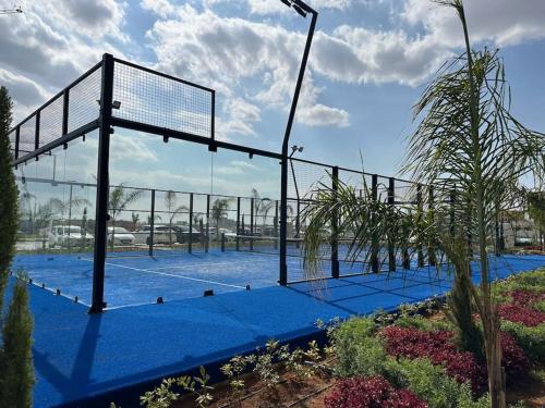 a tennis court with a net on top of it at Grand Sapphire B10-165 luxury Residence By Myguest Cyprus in Iskele