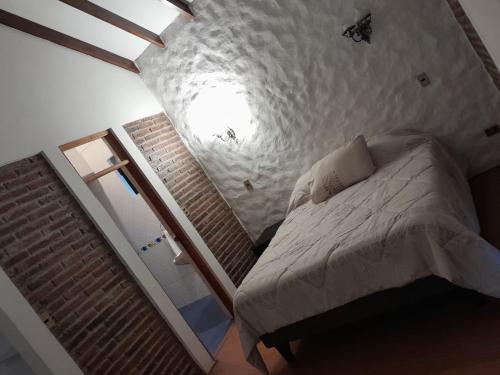 a bedroom with a bed in a room at Estrellas de Elqui in Algarrobito