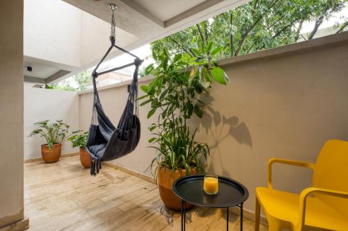 Χώρος καθιστικού στο Caliza Roma Residences by Tasman