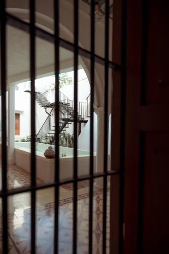 a view of a staircase through a window at Hotel Boutique Casa Jade in Campeche