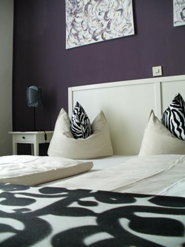 Кровать или кровати в номере Hotel Skada City Cölln