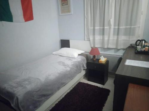 Chambre bleue lit individuel