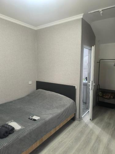 Tempat tidur dalam kamar di Welcome