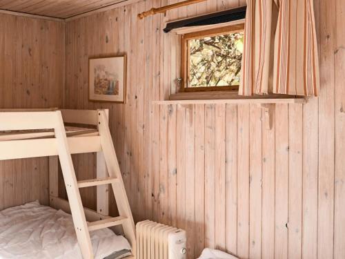Postel nebo postele na pokoji v ubytování 6 person holiday home in Skummeslövsstrand