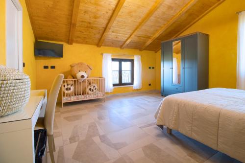 Кровать или кровати в номере Agriturismo Cascina Reggio