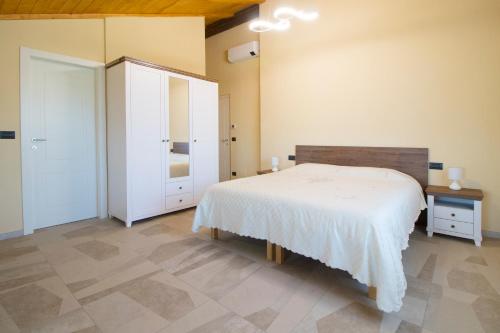 Кровать или кровати в номере Agriturismo Cascina Reggio