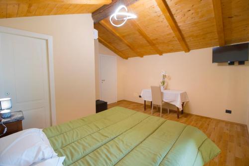 Кровать или кровати в номере Agriturismo Cascina Reggio