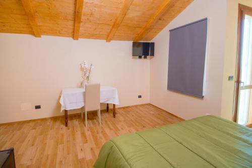 Телевизор и/или развлекательный центр в Agriturismo Cascina Reggio