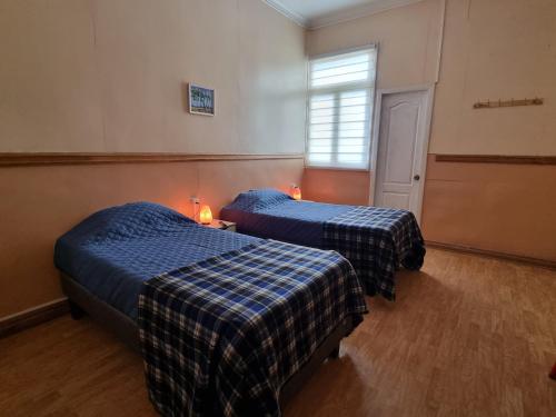 Postel nebo postele na pokoji v ubytování Gauchito Patagón