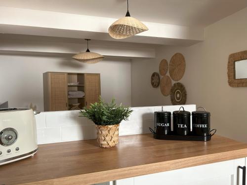 a kitchen with a counter top with a microwave at L'appart in Bandol