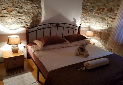 Posteľ alebo postele v izbe v ubytovaní Apartments and Room Perstel