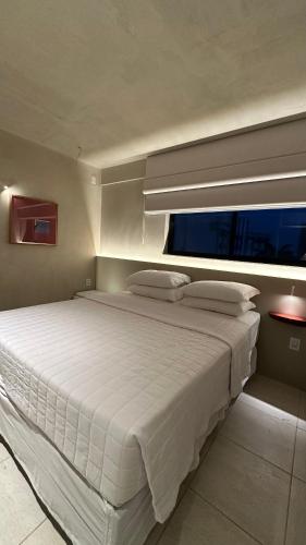 Postel nebo postele na pokoji v ubytování Loft 2 Edf celita Franca Business e flat