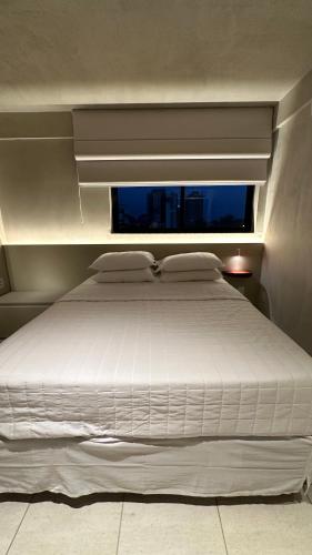 Postel nebo postele na pokoji v ubytování Loft 2 Edf celita Franca Business e flat