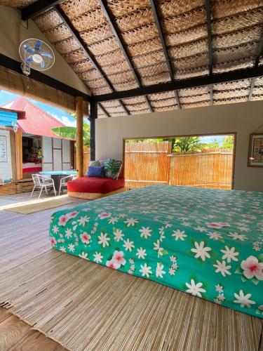 Posezení v ubytování Fare BAMBOO avec PALAPA et piscine partagée