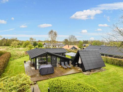 an overhead view of a house with a deck at 6 person holiday home in Hemmet-By Traum in Hemmet