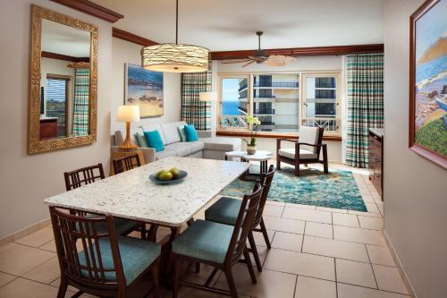 a dining room and living room with a table and chairs at Marriott's Maui Ocean Club - Lahaina & Napili Towers in Lahaina