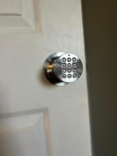 a door knob on a white door at Cozy Private Room in Hammond, IN - 2 in Hammond