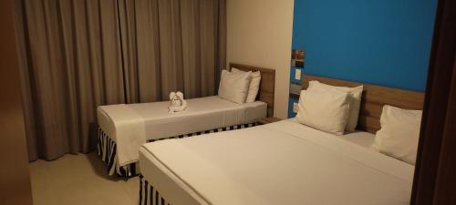 Katil atau katil-katil dalam bilik di Ondas Praia Resort Apart-hotel