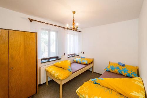Postel nebo postele na pokoji v ubytování Apartmány Havana