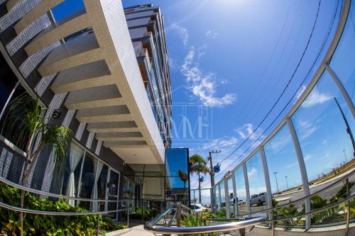 a building with a view of the ocean at Studio Completo a Beira Mar, Grand Smart Residence in Aracaju