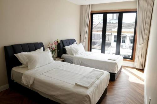 Katil atau katil-katil dalam bilik di M55 Whole House