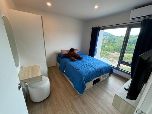 Postel nebo postele na pokoji v ubytování Phyll Phuket - Luxury Resort-Style Comfort