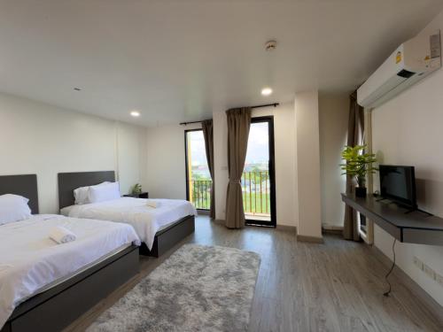Televisyen dan/atau pusat hiburan di Breezewood Bangkok Hotel