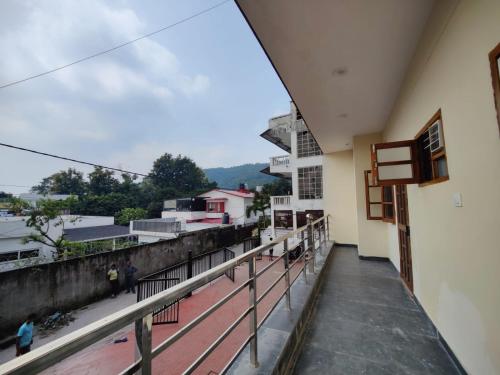 a view from the balcony of a building at Castle INN in Dehradun