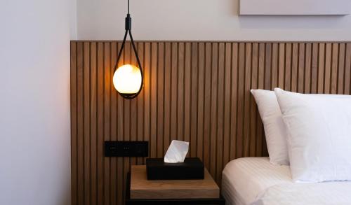 Ένα ή περισσότερα κρεβάτια σε δωμάτιο στο BeL LETTO HOTEL