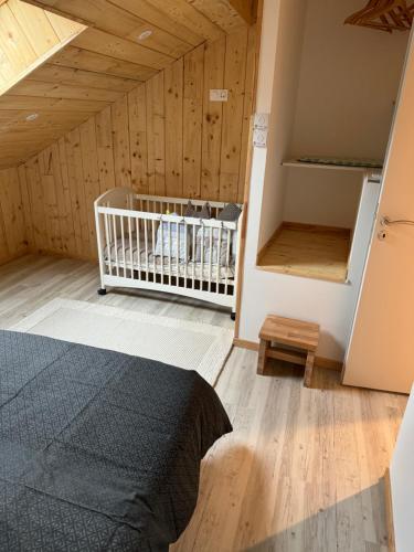 Katil atau katil-katil dalam bilik di Gîte pied du mont fourcat