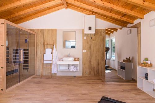 a bathroom with a shower and a sink at Villa Skyora in Trogir