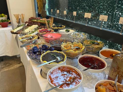 a buffet with many different types of food on a table at Der Inn Lara in Antalya