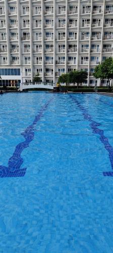 Kolam renang di atau dekat dengan Jazz Apartment Unit