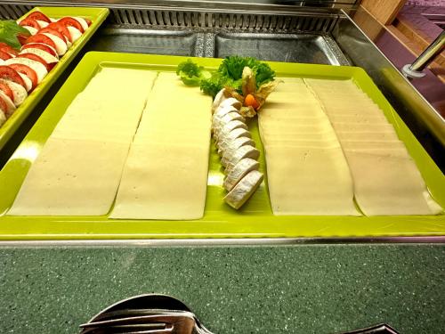 a tray of food on a counter with food on it at Hotel Empfinger Hof, Sure Hotel Collection by Best Western in Empfingen