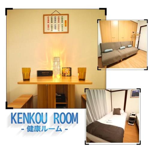 a living room with a table and a couch at KENKOU Room -健康ルーム 大阪- in Osaka