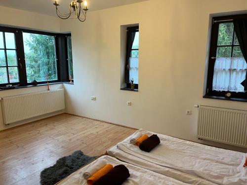 Postel nebo postele na pokoji v ubytování Lakner Lovarda