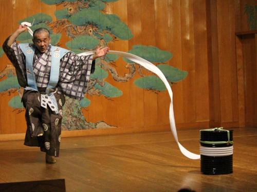a man is dancing with a hula at Sekitaitei Ishida in Achi