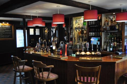 The lounge or bar area at Queenshead Inn 