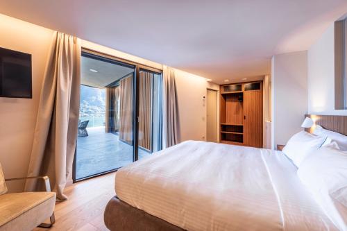 Postel nebo postele na pokoji v ubytování Villa Osee Lago di Como