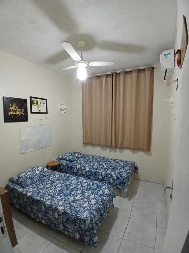 Postel nebo postele na pokoji v ubytování Quarto Privado Cama Casal ou Solteiros Apto