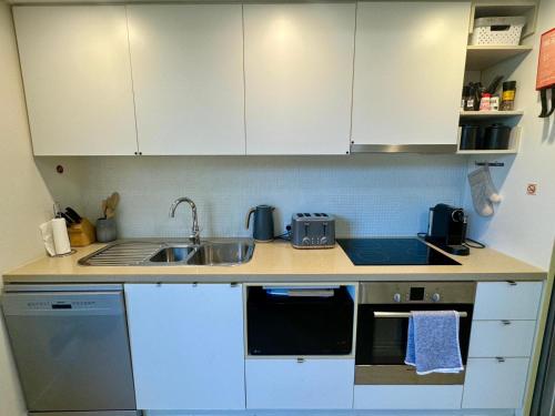 Η κουζίνα ή μικρή κουζίνα στο One Bright Point Euodia Unit 1102