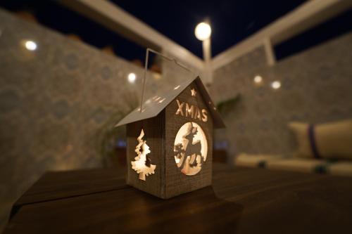 a birdhouse sitting on top of a table at Anza sets house in Agadir