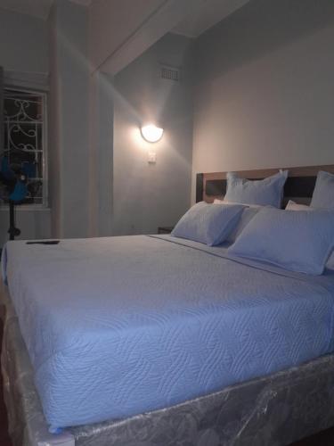 Postel nebo postele na pokoji v ubytování Fife Avenue Guest House