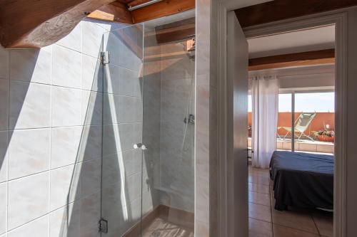 Ένα μπάνιο στο Appartement Les pieds dans l eau