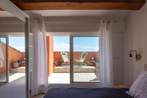 Ένα ή περισσότερα κρεβάτια σε δωμάτιο στο Appartement Les pieds dans l eau